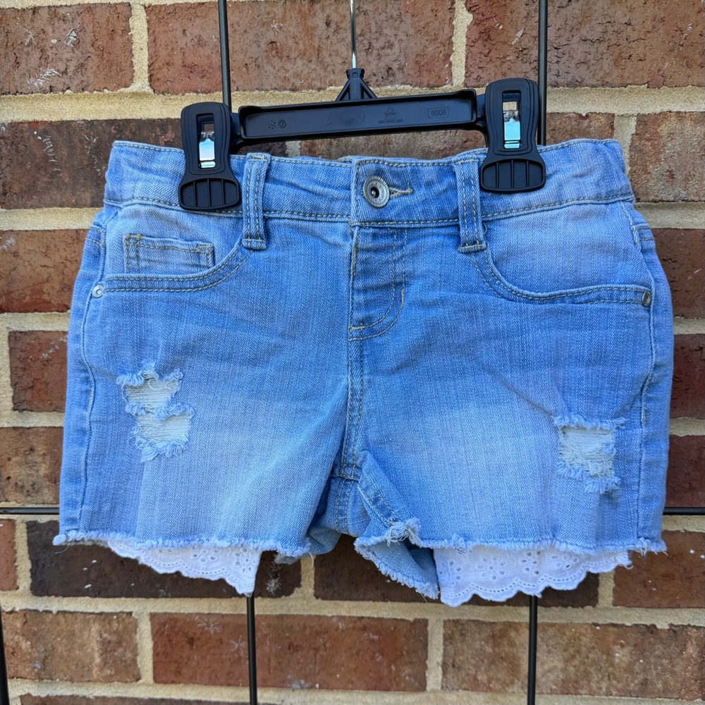 Eyelet Lace pocket distressed cutoffs